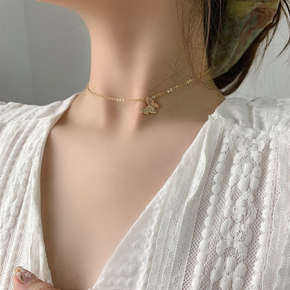 Multi-layered butterfly pearl necklace