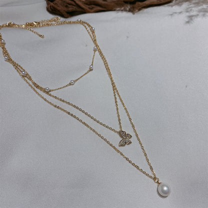 Multi-layered butterfly pearl necklace