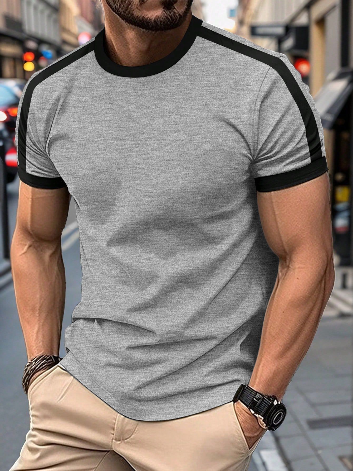 Mens Casual Short-sleeve Sports T-shirt displayed on a man in a casual outdoor setting.