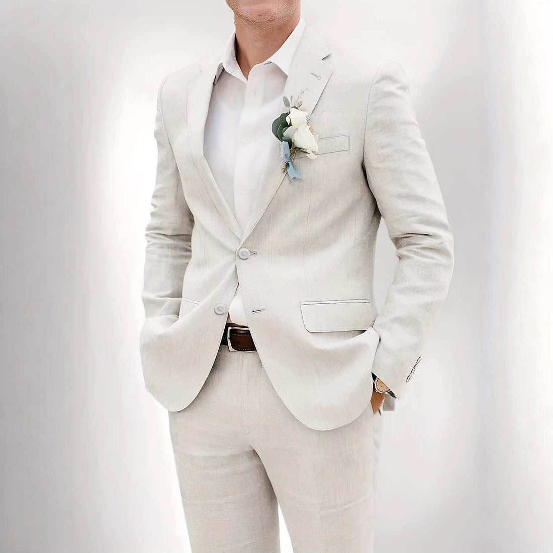 Men’s Fashionable Suits for Balls and Banquets Events worn by a man in a light-colored suit and boutonnière.