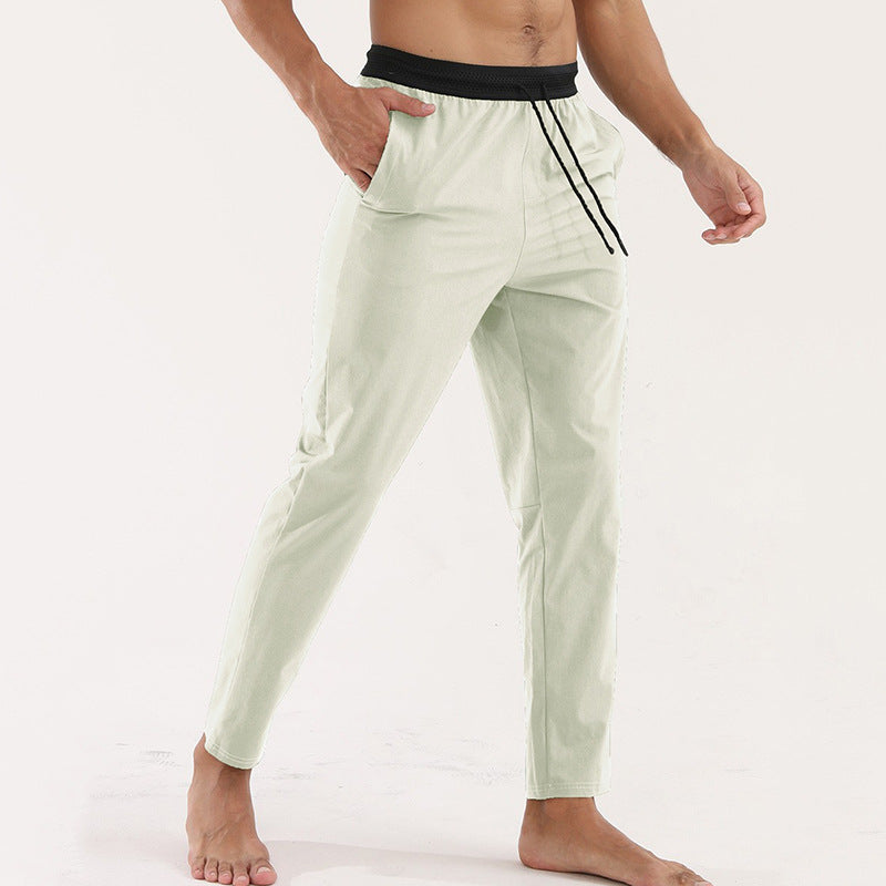 Men’s Thin Sports &amp; Leisure Running Pants – Breathable Fitness in light green, perfect for running and workouts.